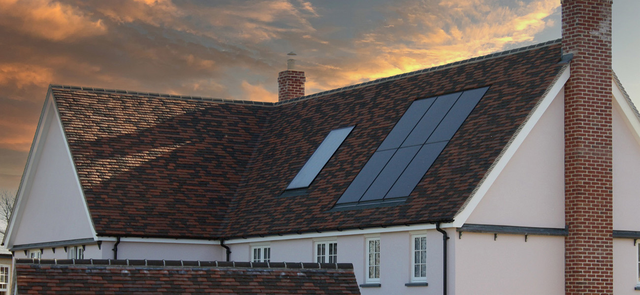 A six grid marley solar tile installation on a close up of a roof