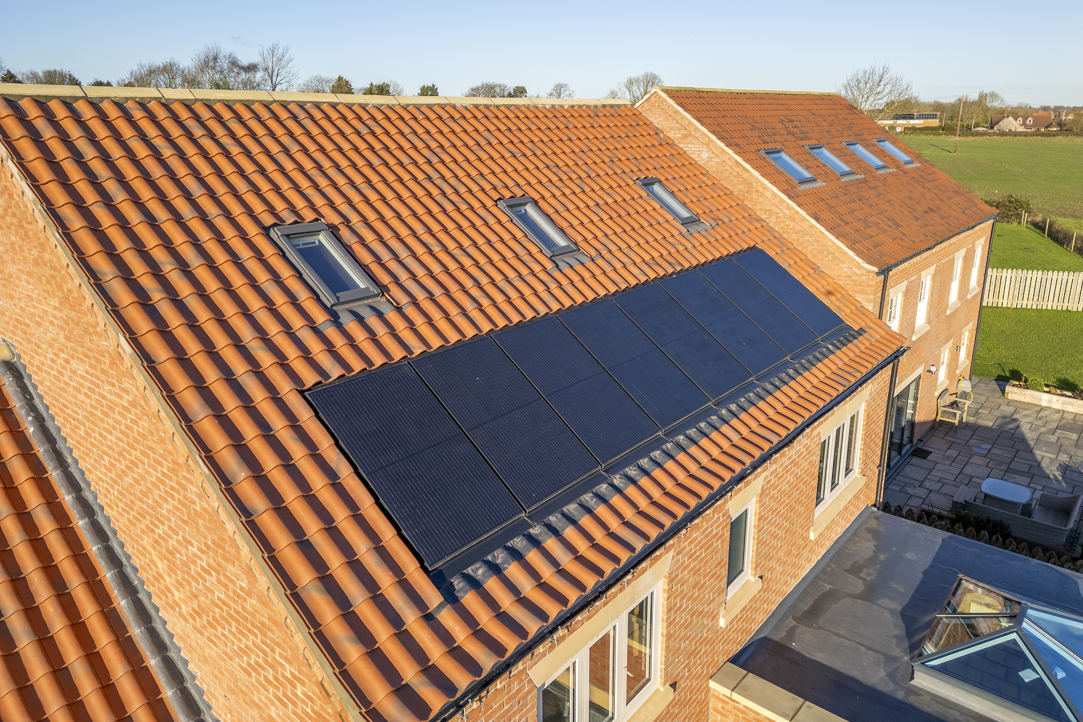 Marley Lincoln clay tiles and solar panels installed on a home development